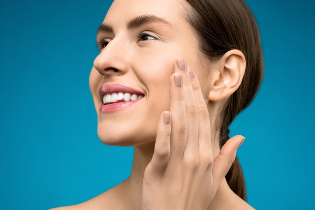 Woman with white straight teeth